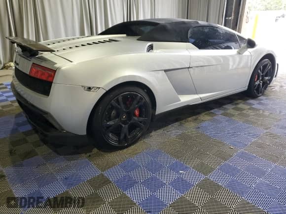 2013 Lamborghini Gallardo z VIN ZHWGU6BZ7DLA12811, wystawiony jako Copart lot #51696395 z przebiegiem 35 389 mil mil oraz Szkoda całkowita • Salvage title. Historia ofert i sprzedaży dostępna na DreamBid. Obrazek 3.