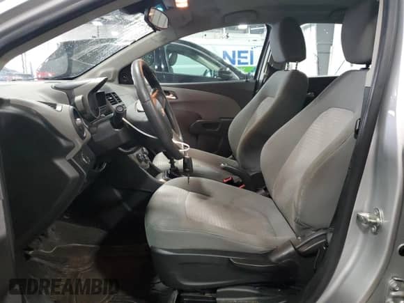2012 Chevrolet Sonic LS с VIN 1G1JB5SH4C4212002, выставлен на аукционе Copart как лот 54702965 с пробегом 96 388 миль миль и Списание • Salvage title. История ставок и продаж доступна на DreamBid. Изображение 7.