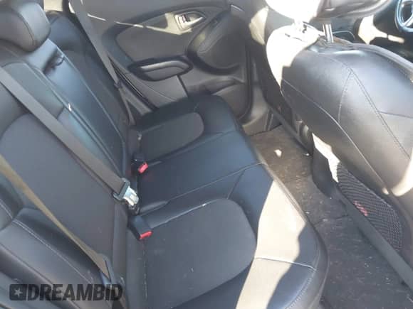 2014 Hyundai Tucson Walking Dead Edition z VIN KM8JUCAG1EU808097, wystawiony jako IAAI lot #41436214 z przebiegiem 114 198 mil mil oraz . Historia ofert i sprzedaży dostępna na DreamBid. Obrazek 8.