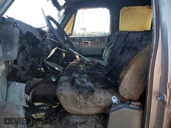 1989 Chevrolet Suburban with VIN 1GNGV26K8KF128711, listed as a Copart auction lot 46658895 with Not provided miles and Salvage title. Bid and sale history available at DreamBid. Image 7.