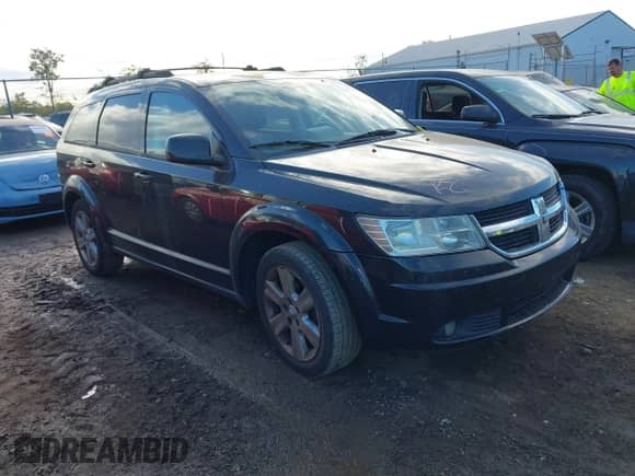 2009 Dodge Journey SXT with VIN 3D4GG57V09T150086, listed as a IAAI auction lot 43372257 with 210,256 mi miles and . Bid and sale history available at DreamBid. Image 1.