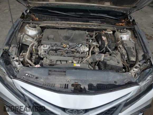2022 Toyota Camry SE z VIN 4T1G11AK1NU712370, wystawiony jako Copart lot #86229765 z przebiegiem 104 657 mil mil oraz Szkoda całkowita • Salvage title. Historia ofert i sprzedaży dostępna na DreamBid. Obrazek 11.
