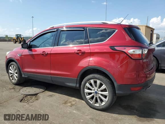 2017 Ford Escape Titanium with VIN 1FMCU9JD4HUD09865, listed as a Copart auction lot 68383735 with 136,198 mi miles and Clean title. Bid and sale history available at DreamBid. Image 2.