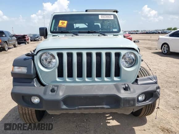 2023 Jeep Wrangler Sport with VIN 1C4HJXAG2PW650279, listed as a Copart auction lot 65038835 with 10,349 mi miles and Salvage title. Bid and sale history available at DreamBid. Image 5.