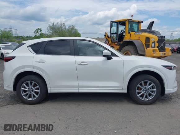 2024 Mazda CX-5 S Preferred z VIN JM3KFBCM7R0364230, wystawiony jako IAAI lot #41859044 z przebiegiem 13 899 mil mil oraz . Historia ofert i sprzedaży dostępna na DreamBid. Obrazek 14.