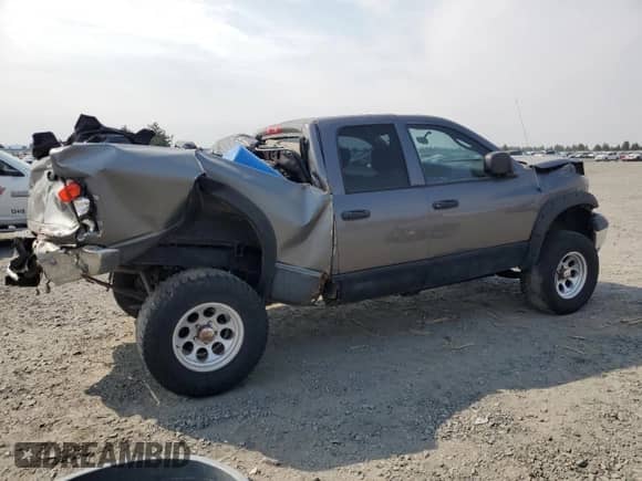 2004 Dodge 1500 SLT z VIN 1D7HU18D54J202861, wystawiony jako Copart lot #69565065 z przebiegiem 184 018 mil mil oraz Szkoda całkowita • Salvage title. Historia ofert i sprzedaży dostępna na DreamBid. Obrazek 3.