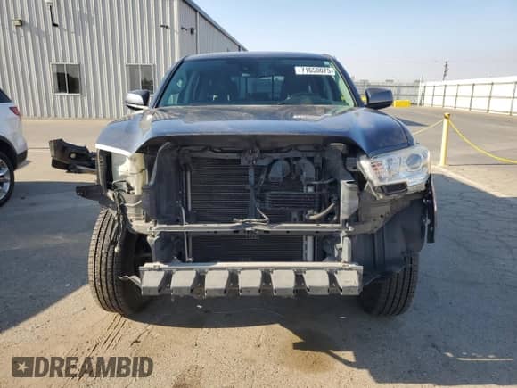2019 Toyota Tacoma SR5 with VIN 3TMBZ5DN5KM019662, listed as a Copart auction lot 71650075 with 105,601 mi miles and Salvage title. Bid and sale history available at DreamBid. Image 5.