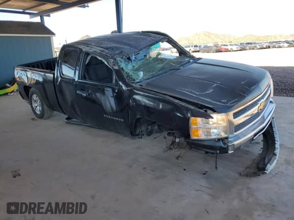 2012 Chevrolet Silverado 1500 LT with VIN 1GCRCSE0XCZ216036, listed as a Copart auction lot 84230885 with 140,797 mi miles and Salvage title. Bid and sale history available at DreamBid. Image 4.
