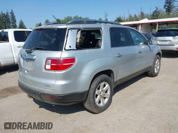 2009 Saturn Outlook XR with VIN 5GZEV23D99J132827, listed as a IAAI auction lot 42105293 with 133,695 mi miles and . Bid and sale history available at DreamBid. Image 4.
