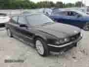 1995 BMW 7 Series with VIN WBAGK2321SDH66428, listed as a Copart auction lot 71174444 with Not provided miles and Salvage title. Bid and sale history available at DreamBid. Image 4.