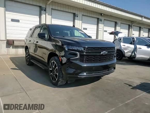 2023 Chevrolet Tahoe RST с VIN 1GNSKRKD8PR215839, выставлен на аукционе Copart как лот 81116105 с пробегом 32 243 миль миль и Списание • Salvage title. История ставок и продаж доступна на DreamBid. Изображение 14.