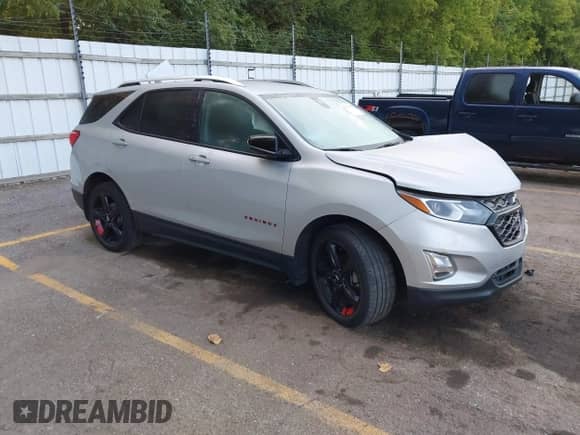 2021 Chevrolet Equinox Premier with VIN 2GNAXXEV8M6164551, listed as a IAAI auction lot 43130369 with 35,768 mi miles and . Bid and sale history available at DreamBid. Image 1.