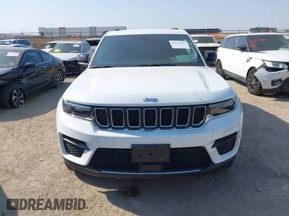 2022 Jeep Grand Cherokee Laredo z VIN 1C4RJHAG8N8597860, wystawiony jako IAAI lot #42033325 z przebiegiem 65 491 mil mil oraz . Historia ofert i sprzedaży dostępna na DreamBid. Obrazek 13.