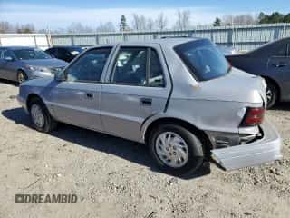 1994 Dodge Shadow with VIN 1B3AP28D5RN193704, listed as a Copart auction lot 82825004 with 90,223 mi miles and Salvage title. Bid and sale history available at DreamBid. Image 2.