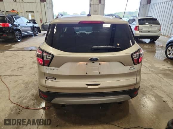 2017 Ford Escape SE с VIN 1FMCU9GD7HUC21075, выставлен на аукционе Copart как лот 82115645 с пробегом 91 949 миль миль и На запчасти • Non repairable. История ставок и продаж доступна на DreamBid. Изображение 6.