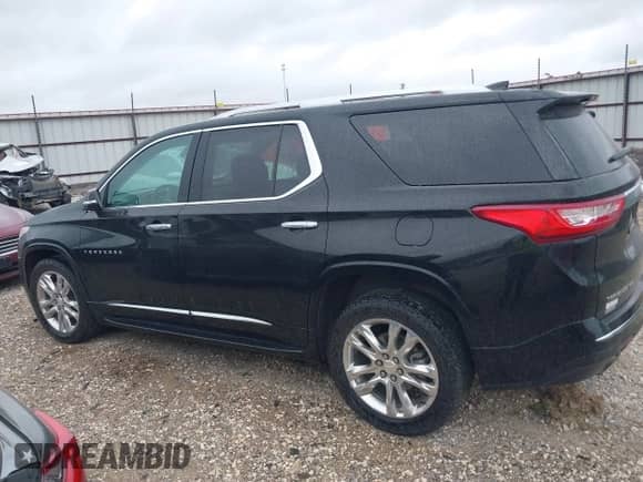 2021 Chevrolet Traverse High Country z VIN 1GNEVNKW4MJ165059, wystawiony jako IAAI lot #41887403 z przebiegiem 92 519 mil mil oraz . Historia ofert i sprzedaży dostępna na DreamBid. Obrazek 14.