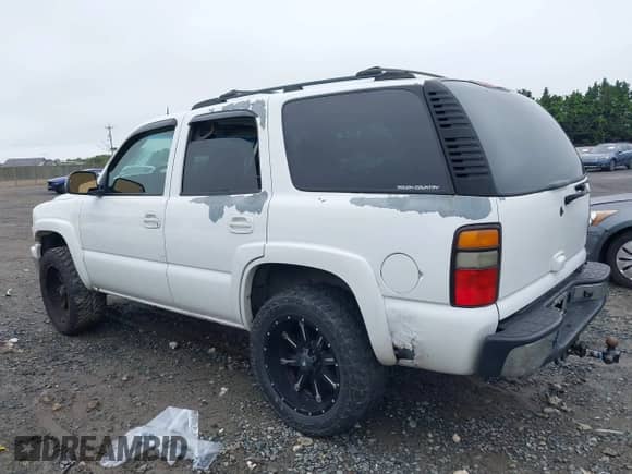 2005 Chevrolet Tahoe LT with VIN 1GNEK13T65J160906, listed as a IAAI auction lot 42518293 with 301,009 mi miles and . Bid and sale history available at DreamBid. Image 3.