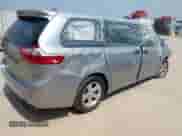 2015 Toyota Sienna L with VIN 5TDZK3DCXFS627611, listed as a IAAI auction lot 42823348 with 298,381 mi miles and . Bid and sale history available at DreamBid. Image 2.