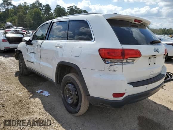 2019 Jeep Grand Cherokee Laredo E with VIN 1C4RJEAG9KC598264, listed as a Copart auction lot 87252015 with 101,546 mi miles and Salvage title. Bid and sale history available at DreamBid. Image 2.