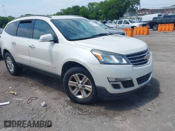 2013 Chevrolet Traverse LT z VIN 1GNKRGKD9DJ234250, wystawiony jako IAAI lot #42584700 z przebiegiem 197 535 mil mil oraz . Historia ofert i sprzedaży dostępna na DreamBid. Obrazek 1.