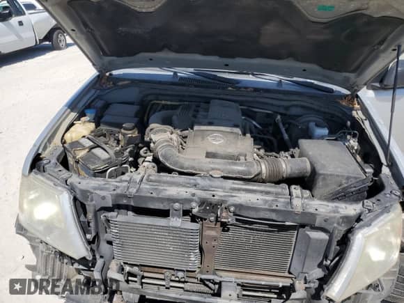 2014 Nissan Frontier S z VIN 1N6AD0EVXEN717297, wystawiony jako Copart lot #53558875 z przebiegiem 173 004 mil mil oraz Szkoda całkowita • Salvage title. Historia ofert i sprzedaży dostępna na DreamBid. Obrazek 11.