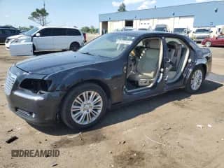 2012 Chrysler 300 C с VIN 2C3CCAKT5CH197124, выставлен на аукционе Copart как лот 63137145 с пробегом 159 157 миль миль и Чистый • Clean title. История ставок и продаж доступна на DreamBid. Изображение 1.