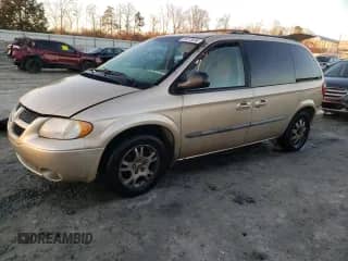 2001 Dodge Caravan with VIN 1B8GP45GX1B101135, listed as a Copart auction lot 86878834 with 154,740 mi miles and Salvage title. Bid and sale history available at DreamBid. Image 1.