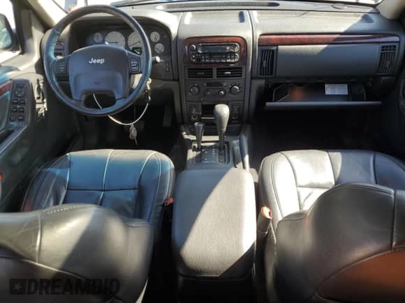 2002 Jeep Grand Cherokee Limited z VIN 1J8GW58J32C256389, wystawiony jako Copart lot #80217465 z przebiegiem 129 610 mil mil oraz Szkoda całkowita • Salvage title. Historia ofert i sprzedaży dostępna na DreamBid. Obrazek 8.