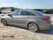 2013 Hyundai Sonata SE with VIN 5NPEC4AC9DH667073, listed as a Copart auction lot 70766815 with 165,685 mi miles and Salvage title. Bid and sale history available at DreamBid. Image 2.