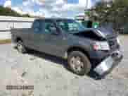 2006 Ford F-150 STX with VIN 1FTRX12W56NA18435, listed as a Copart auction lot 85090315 with 217,581 mi miles and Salvage title. Bid and sale history available at DreamBid. Image 4.