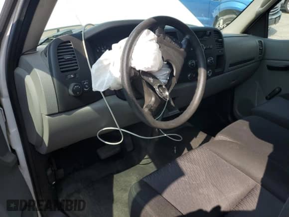 2013 Chevrolet Silverado 1500 Work Truck z VIN 1GCNCPEX6DZ387408, wystawiony jako Copart lot #68918755 z przebiegiem 171 170 mil mil oraz Szkoda całkowita • Salvage title. Historia ofert i sprzedaży dostępna na DreamBid. Obrazek 8.