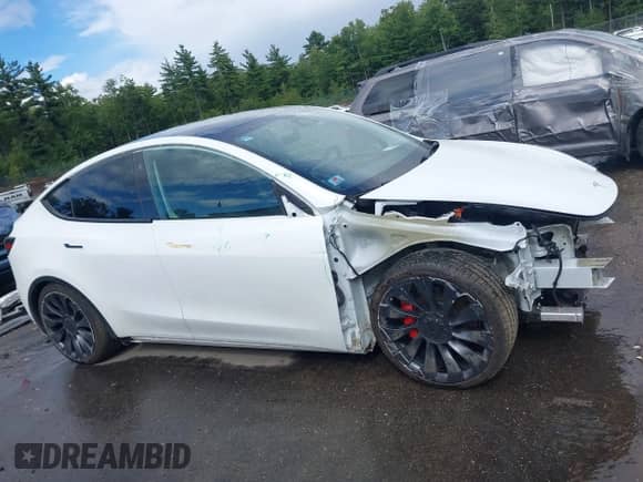 2022 Tesla Model Y Performance with VIN 7SAYGDEF7NF540878, listed as a IAAI auction lot 43102241 with 48,998 mi miles and . Bid and sale history available at DreamBid. Image 14.