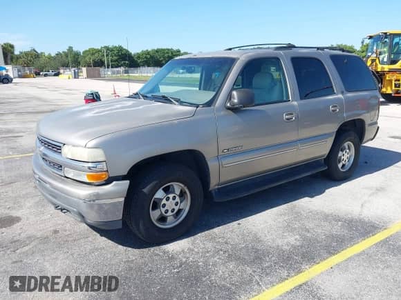 2001 Chevrolet Tahoe LS with VIN 1GNEC13T31J128812, listed as a IAAI auction lot 42855462 with 268,691 mi miles and . Bid and sale history available at DreamBid. Image 2.