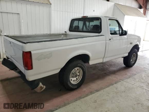 1995 Ford F-150 with VIN 1FTEF14N4SNA51085, listed as a Copart auction lot 60658455 with 157,713 mi miles and Salvage title. Bid and sale history available at DreamBid. Image 3.