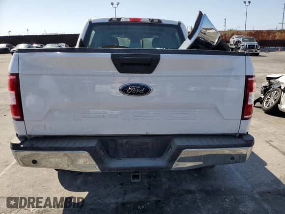 2019 Ford F-150 XL with VIN 1FTEW1C58KKD38285, listed as a Copart auction lot 71183105 with 89,327 mi miles and Salvage title. Bid and sale history available at DreamBid. Image 6.