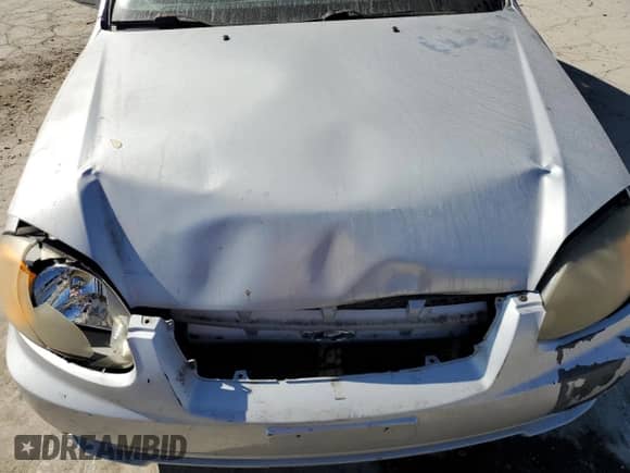 2005 Hyundai Accent GLS с VIN KMHCG45C75U638812, выставлен на аукционе Copart как лот 77968234 с пробегом 130 815 миль миль и Списание • Salvage title. История ставок и продаж доступна на DreamBid. Изображение 12.