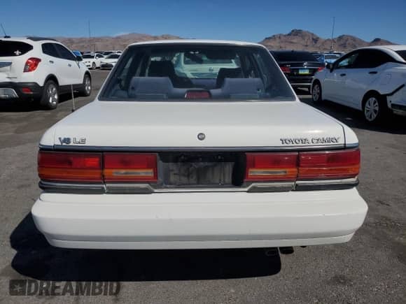 1991 Toyota Camry z VIN 4T1VV22E9MU060249, wystawiony jako Copart lot #51387785 z przebiegiem 153 405 mil mil oraz Czysty tytuł • Clean title. Historia ofert i sprzedaży dostępna na DreamBid. Obrazek 6.