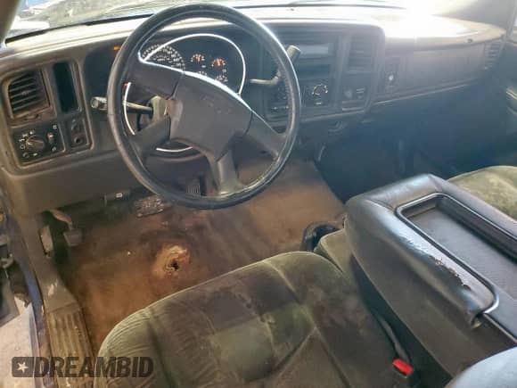 2004 Chevrolet Silverado 1500 Work Truck with VIN 1GCEC19X24Z216534, listed as a Copart auction lot 67316415 with 185,770 mi miles and Salvage title. Bid and sale history available at DreamBid. Image 8.