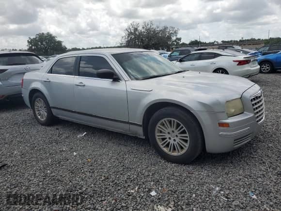 2009 Chrysler 300 LX with VIN 2C3KA43D79H577844, listed as a Copart auction lot 65502145 with 119,286 mi miles and Clean title. Bid and sale history available at DreamBid. Image 4.