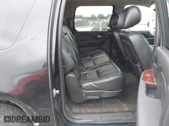 2010 Chevrolet Suburban LT z VIN 1GNUKJE38AR250305, wystawiony jako IAAI lot #43368811 z przebiegiem 296 875 mil mil oraz . Historia ofert i sprzedaży dostępna na DreamBid. Obrazek 8.