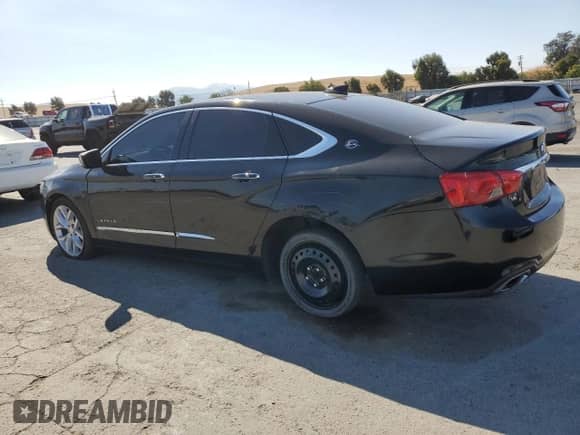 2015 Chevrolet Impala LTZ with VIN 2G1165S36F9106600, listed as a Copart auction lot 71864105 with 161,086 mi miles and Salvage title. Bid and sale history available at DreamBid. Image 2.