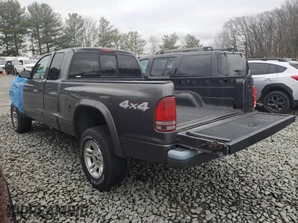 2003 Dodge Dakota с VIN 1D7HG12X93S350367, выставлен на аукционе Copart как лот 38855714 с пробегом 212 097 миль миль и Списание • Salvage title. История ставок и продаж доступна на DreamBid. Изображение 2.