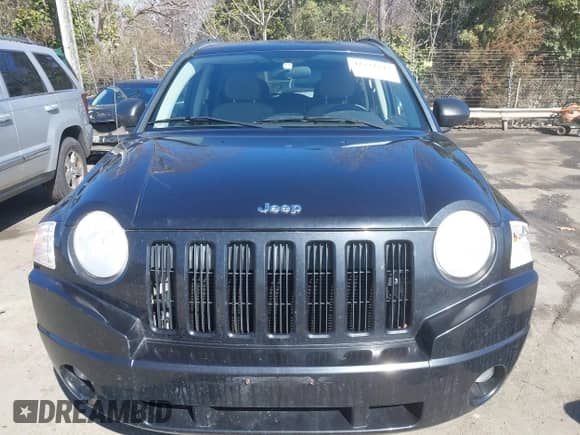 2010 Jeep Compass Sport z VIN 1J4NT1FB1AD624776, wystawiony jako IAAI lot #41571247 z przebiegiem 172 799 mil mil oraz . Historia ofert i sprzedaży dostępna na DreamBid. Obrazek 12.