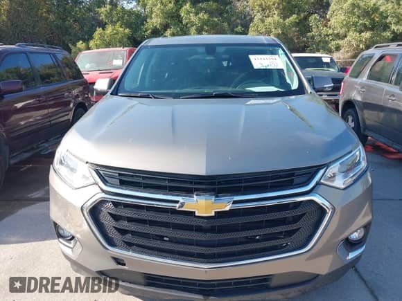 2018 Chevrolet Traverse LT Cloth z VIN 1GNERGKW3JJ209693, wystawiony jako IAAI lot #43443294 z przebiegiem 105 300 mil mil oraz . Historia ofert i sprzedaży dostępna na DreamBid. Obrazek 12.