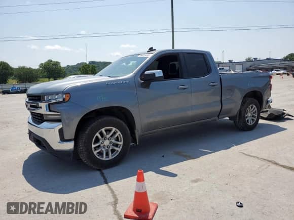 2019 Chevrolet Silverado 1500 LT with VIN 1GCRYDEK8KZ275647, listed as a Copart auction lot 58829495 with 124,577 mi miles and Salvage title. Bid and sale history available at DreamBid. Image 1.