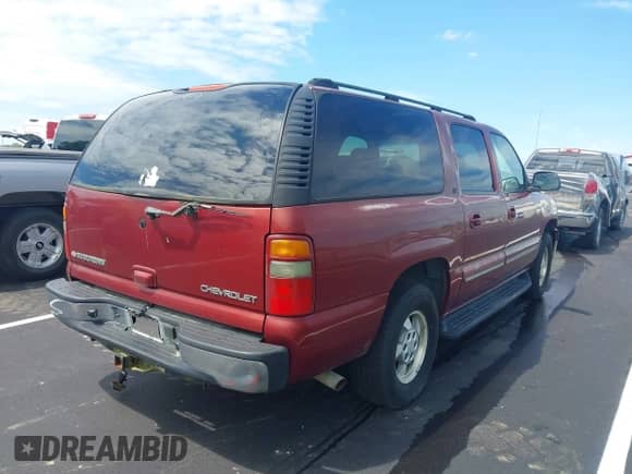 2003 Chevrolet Suburban LT z VIN 1GNEC16Z63J215591, wystawiony jako IAAI lot #42853057 z przebiegiem 292 607 mil mil oraz . Historia ofert i sprzedaży dostępna na DreamBid. Obrazek 4.