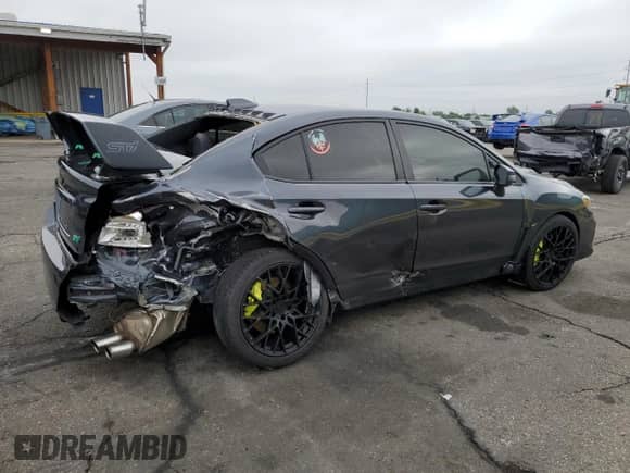 2018 Subaru WRX STI with VIN JF1VA2M6XJ9822515, listed as a Copart auction lot 65383945 with 76,344 mi miles and Salvage title. Bid and sale history available at DreamBid. Image 3.