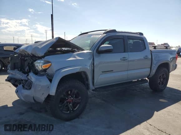 2018 Toyota Tacoma TRD Sport with VIN 3TMAZ5CNXJM074796, listed as a Copart auction lot 84055345 with 79,231 mi miles and Salvage title. Bid and sale history available at DreamBid. Image 1.