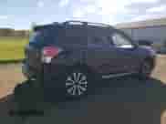 2017 Subaru Forester Touring z VIN JF2SJGWCXHH543032, wystawiony jako Copart lot #82477415 z przebiegiem 154 499 mil mil oraz Szkoda całkowita • Salvage title. Historia ofert i sprzedaży dostępna na DreamBid. Obrazek 3.