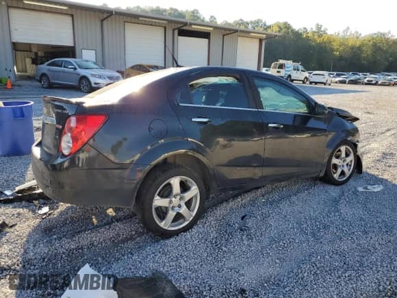 2014 Chevrolet Sonic LTZ с VIN 1G1JE5SB1E4177635, выставлен на аукционе Copart как лот 84280825 с пробегом Не указан миль и Списание • Salvage title. История ставок и продаж доступна на DreamBid. Изображение 3.